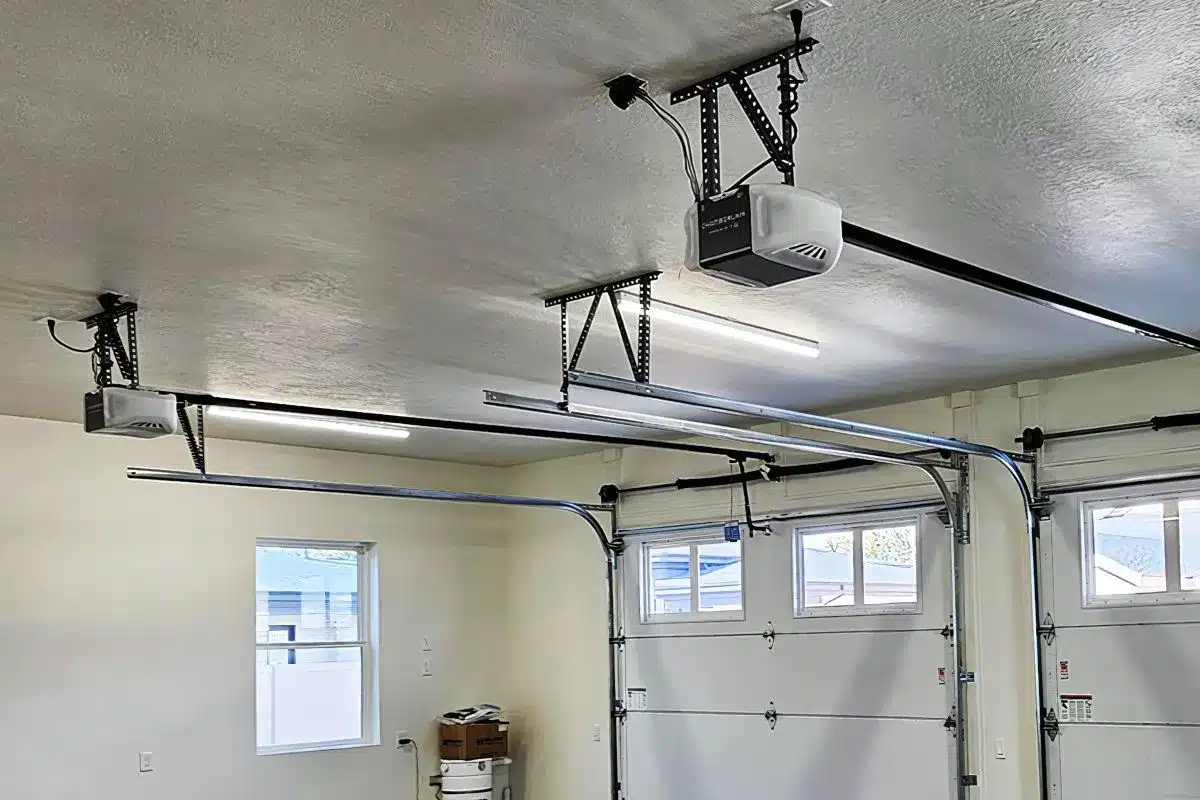 Overhead garage door opener repair in Layton, Utah by Beacon Garage Doors technician