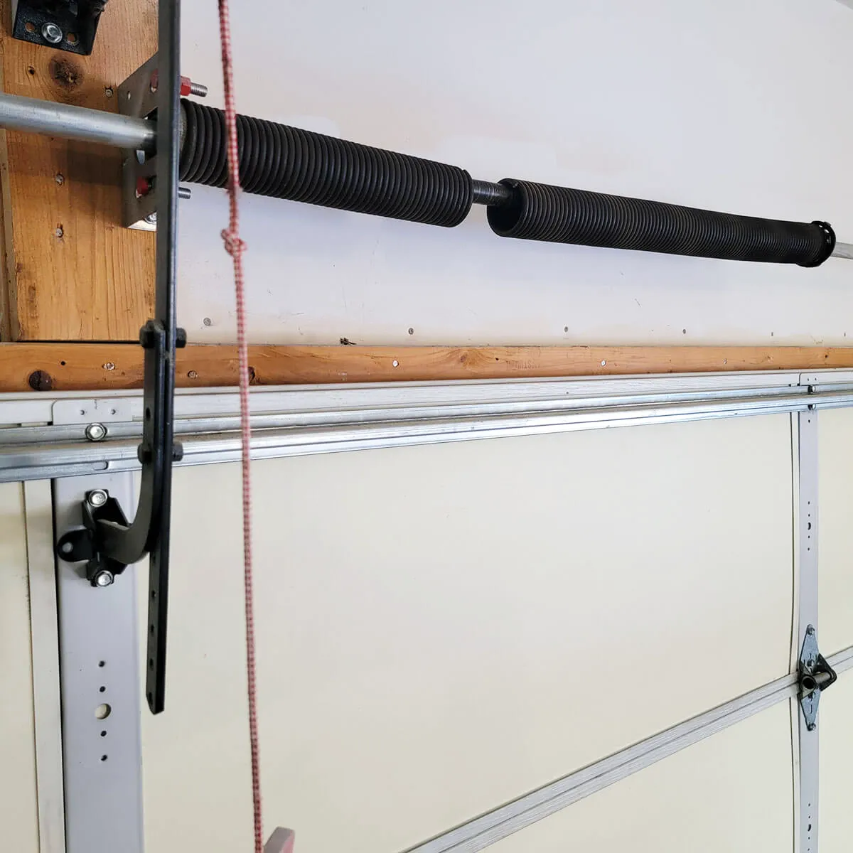 Garage door torsion spring replacement in Utah by Beacon Garage Doors for fast same-day repair service