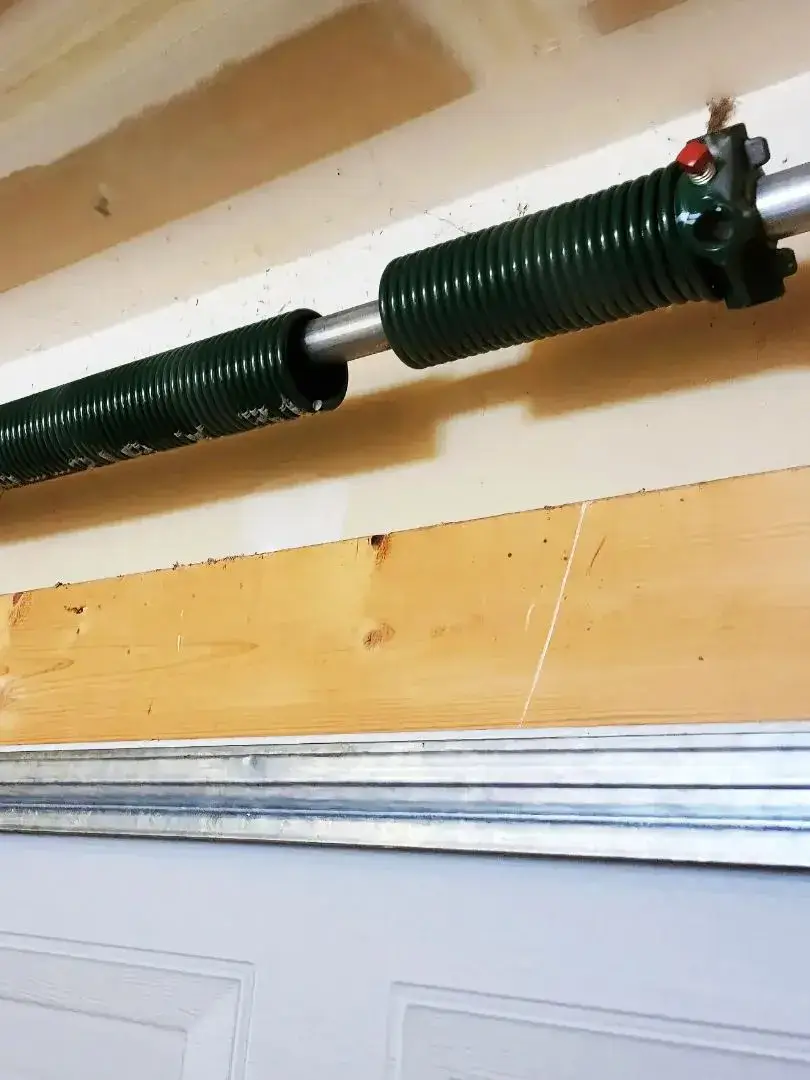 Broken garage door spring in Riverdale, UT – professional torsion spring repair by Beacon Garage Doors